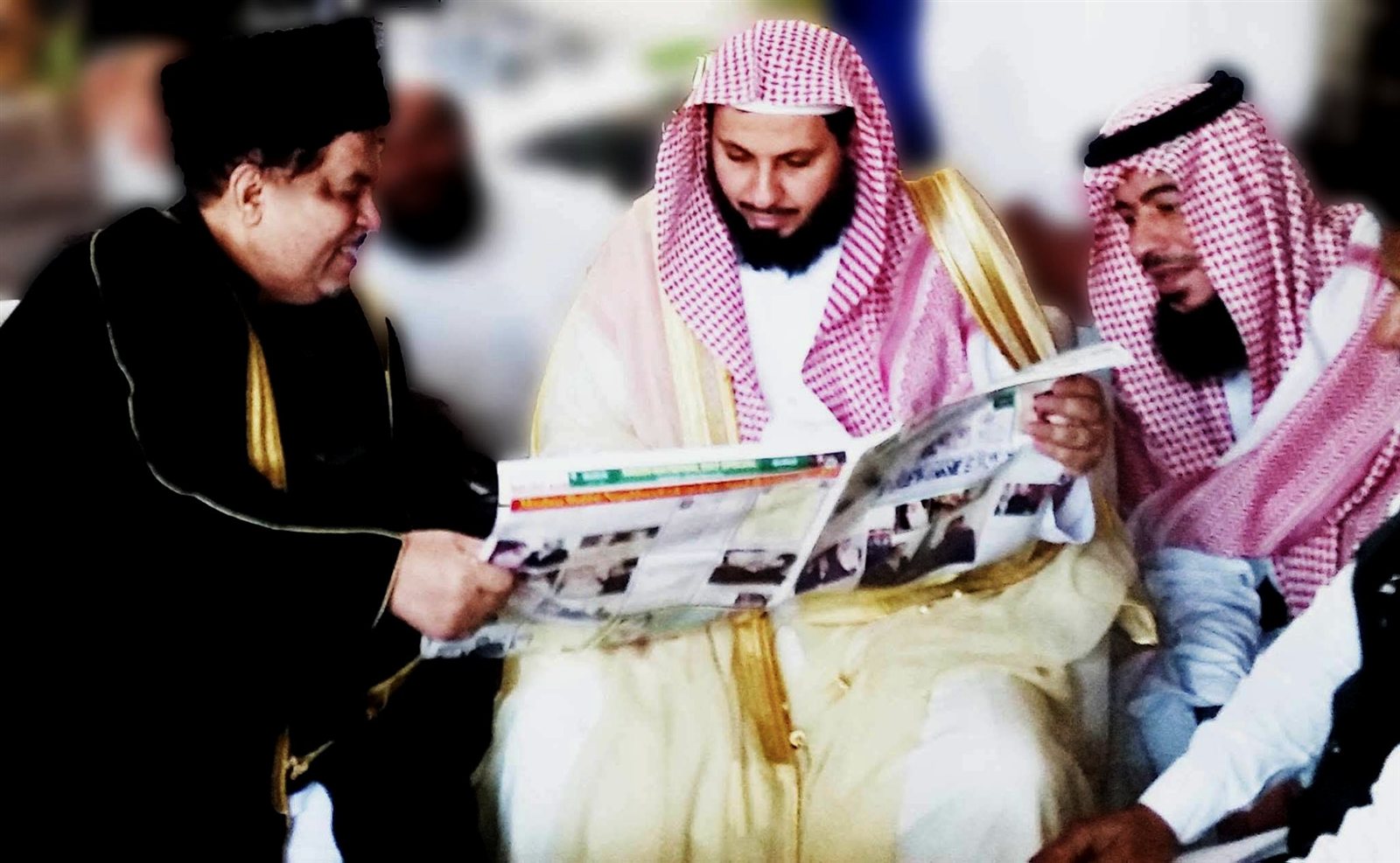 A formal photograph with the Imam of Masjid al-Haram, Makkah, Sheikh Saleh Mohammed Ibrahim