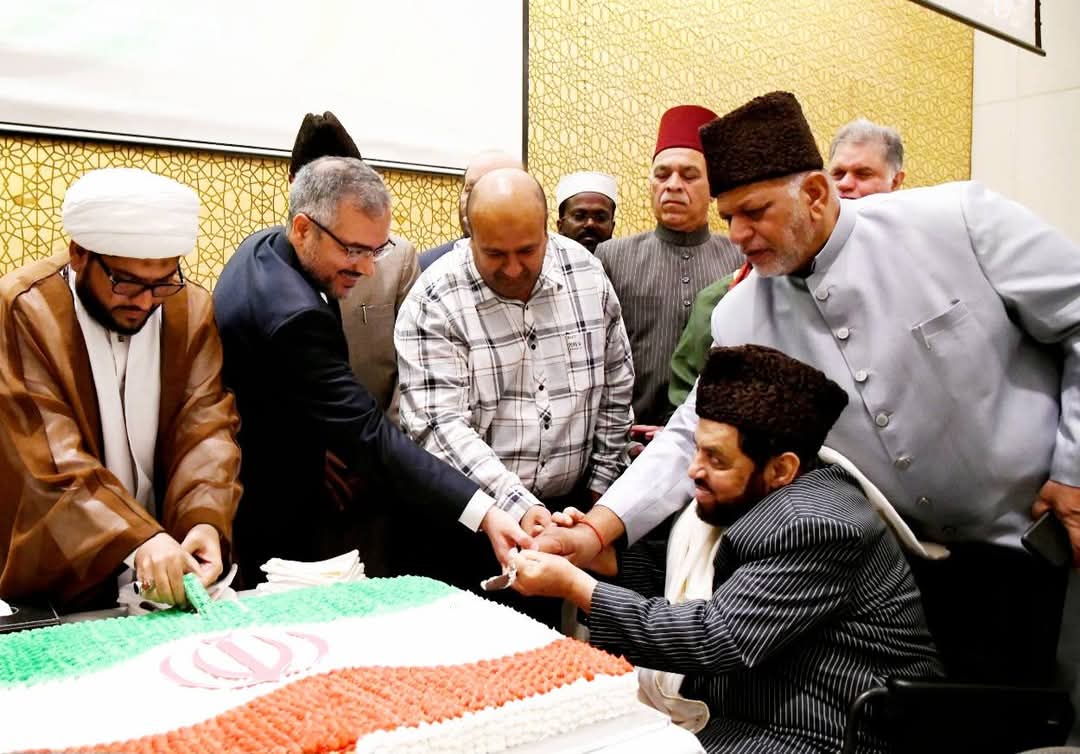 Cutting the National Day cake with the Consul General of Iran at the 46th National Day of Iran celebration, Hyderabad