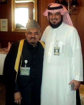 Receiving a memento on behalf of King Abdullah Bin Abdul Aziz from HE Abdullah Bin Madlij Al Madlij, Madina Munawarrah