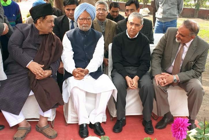 A casual moment with former Prime Minister Manmohan Singh, Justice Badar Ahmed and Dr. Syed Farooq