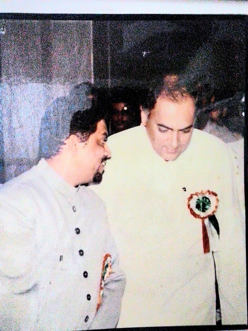 With Prime Minister Rajiv Gandhi at a public function
